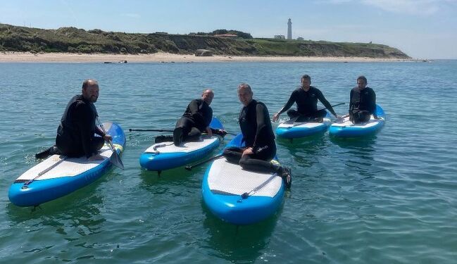 Stand Up Paddling med Surf og Natur ud for Husmoderstranden. Foto (arkiv): Surf og Natur.