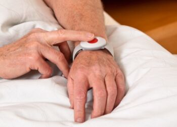 rufhilfe with a senior emergency phone in bed